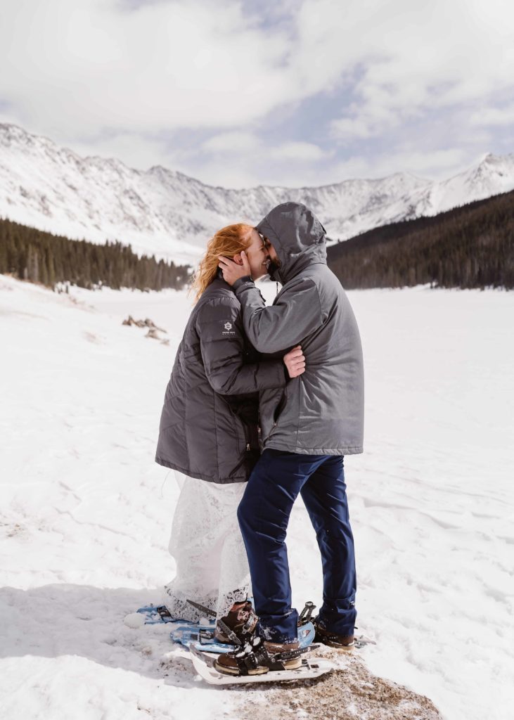 Couple snowshoes in Colorado for their elopement