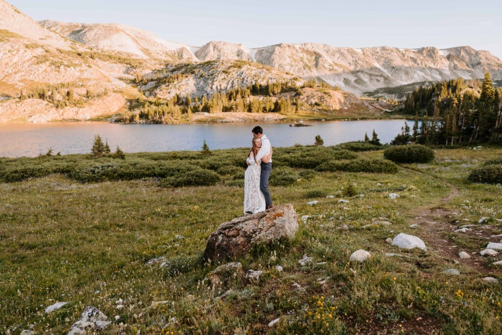 Couple hugs each other during their camping elopement in Wyoming