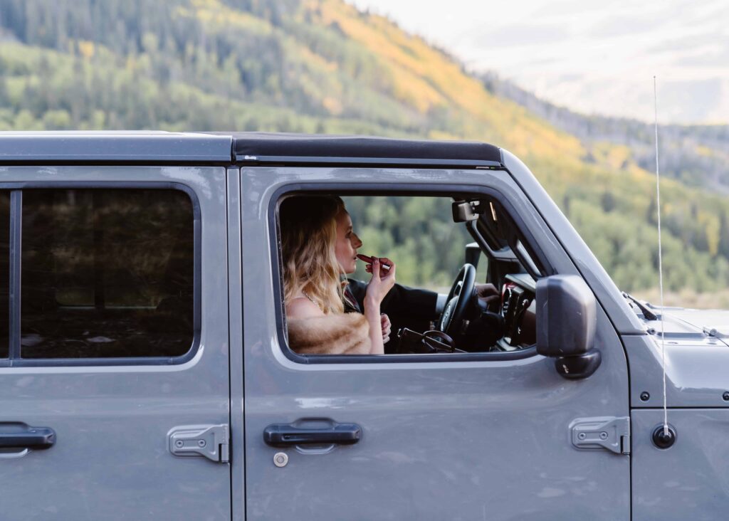 Couple stands in an Aspen grove during their Telluride Jeeping elopement