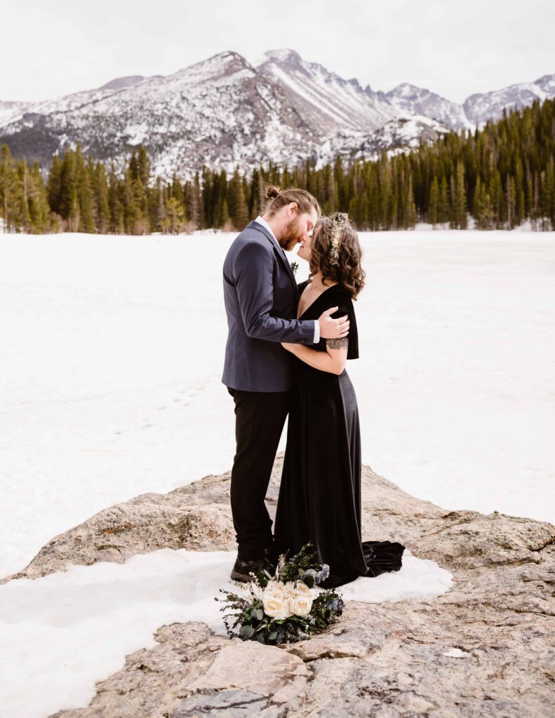 Couple has portraits after their Winter Rocky Mountain National Park Elopement