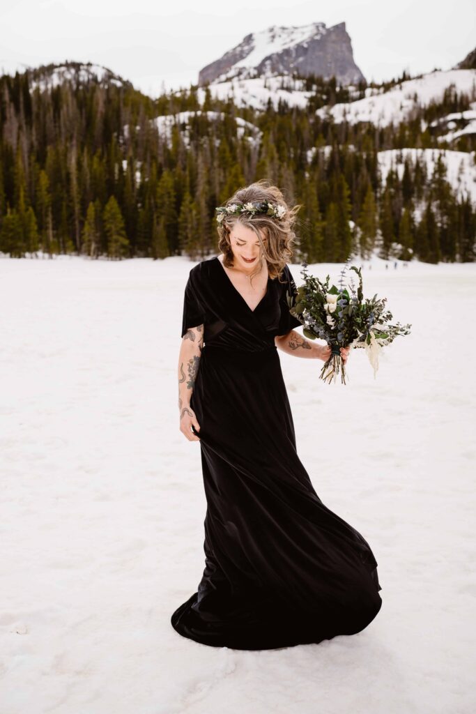 Couple has portraits after their Winter Rocky Mountain National Park Elopement