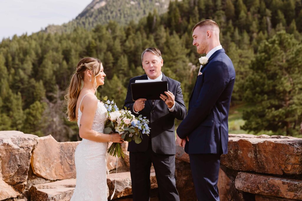 Officiant leads ceremony at mountain wedding in Boulder, Colorado