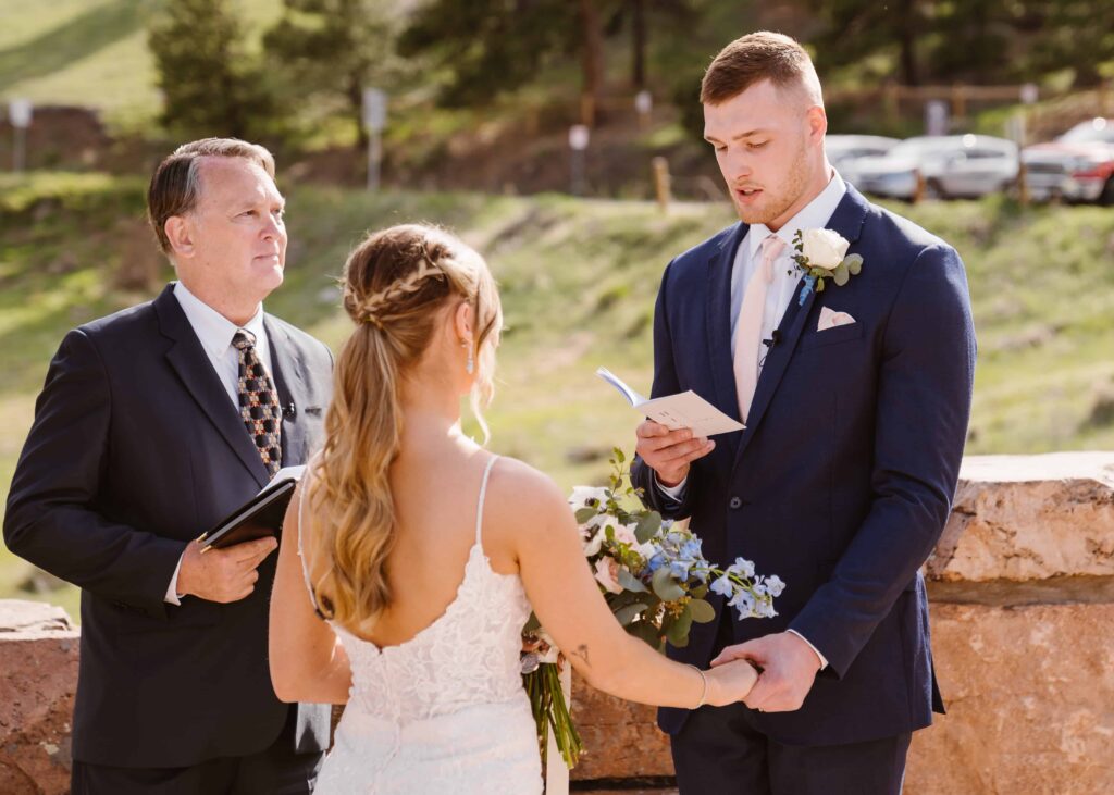 Groom reads his vows during the ceremony