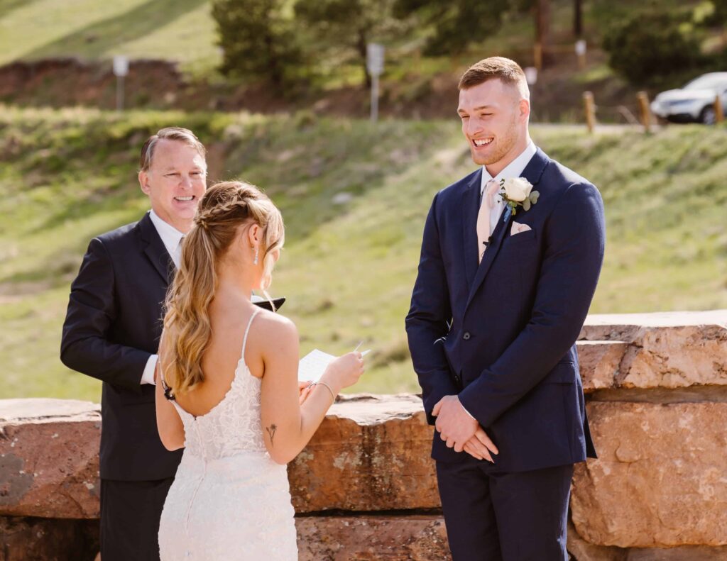 Groom laughs when bride reads her vows
