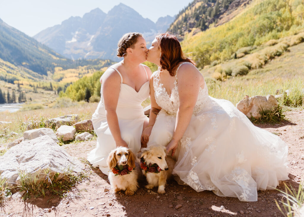 Lesbian couple elopes at the Maroon Bells Amphitheater in Aspen, Colorado with their two dogs