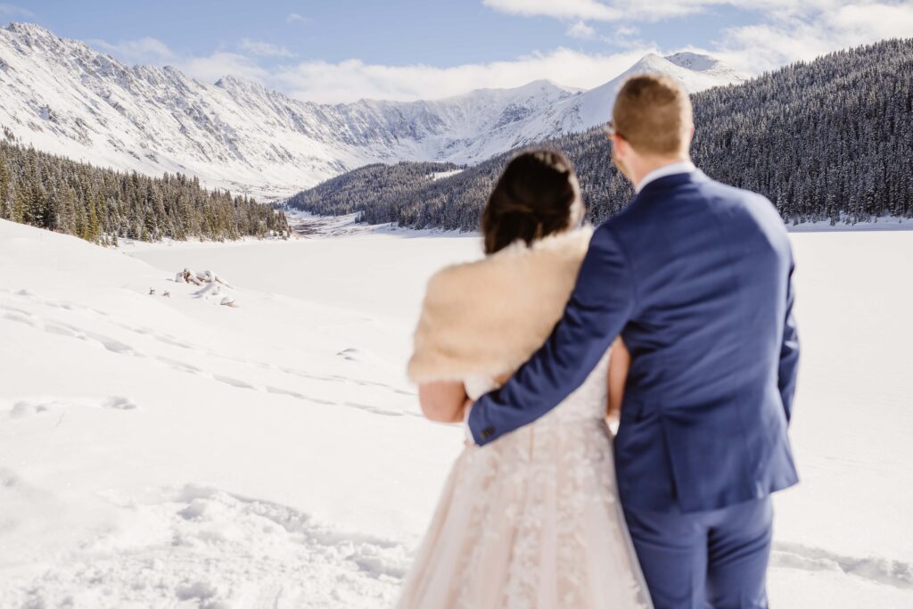 Couple has snowy portraits after their elopement ceremony in Breckenridge, Colorado