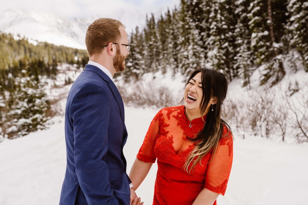 Couple laughs as they celebrate their elopement in Colorado