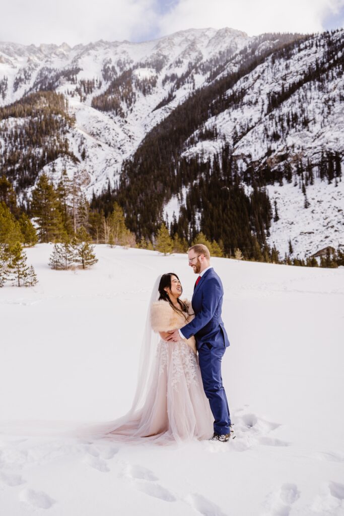 Snowy couples portraits before their elopement in Breckenridge, Colorado