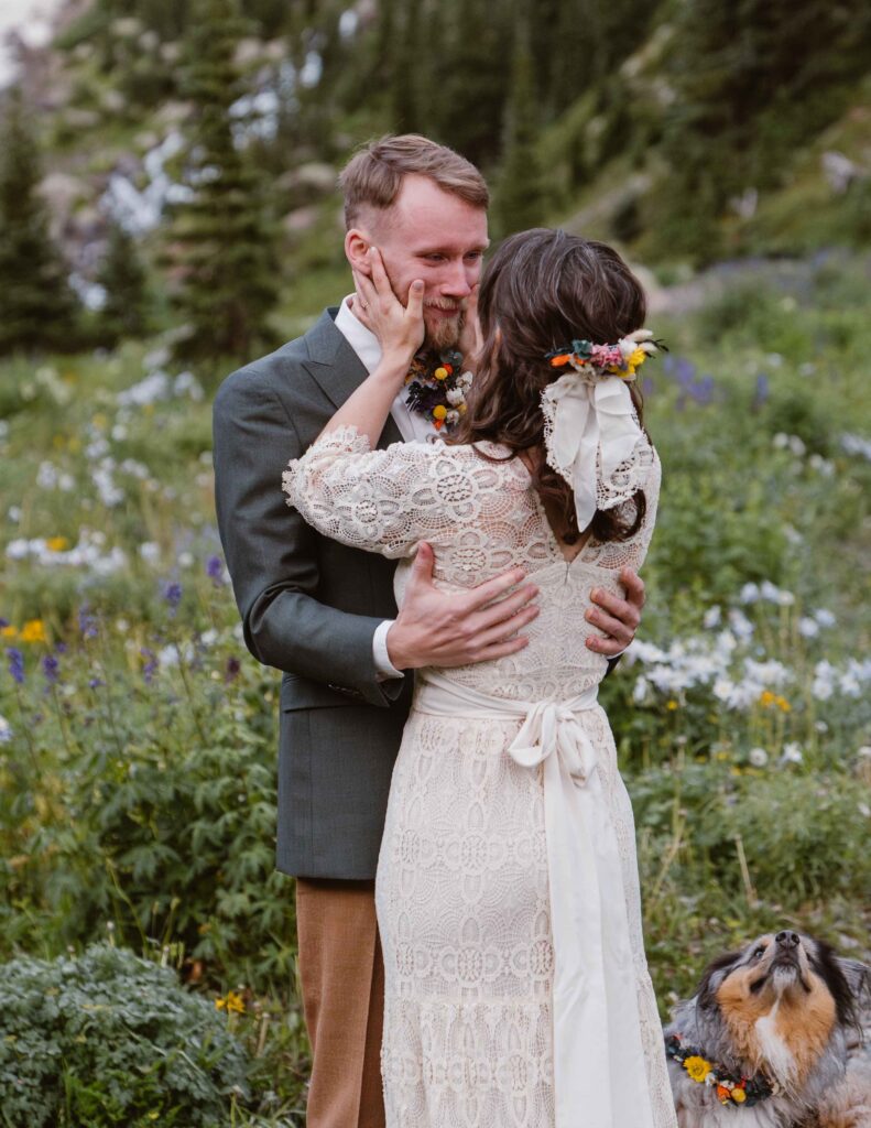 Couple has their first look at their elopement at Blue Lakes in Ridgway, Colorado