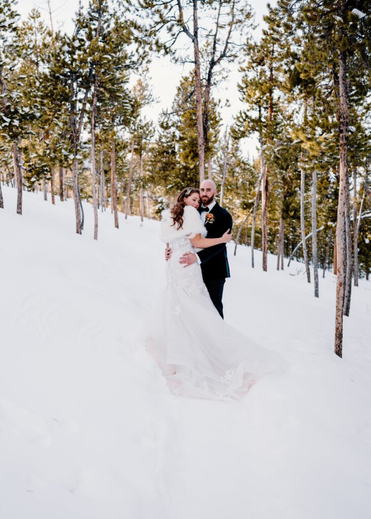 Eloping couples sunset portraits after their Sapphire Point Overlook wedding in Breckenridge, Colorado