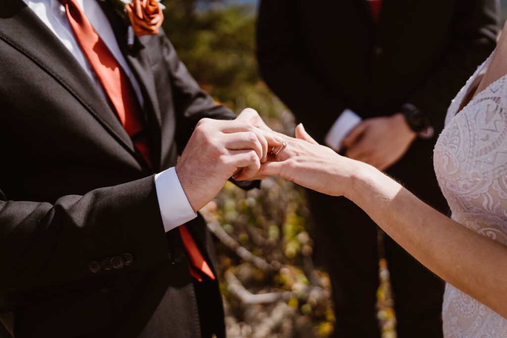Couple exchanges rings at their elopement