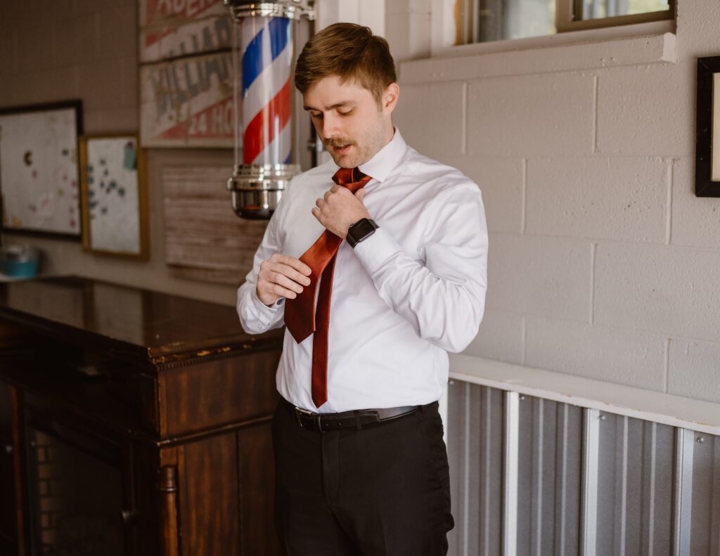 Groom gets ready for his wedding day