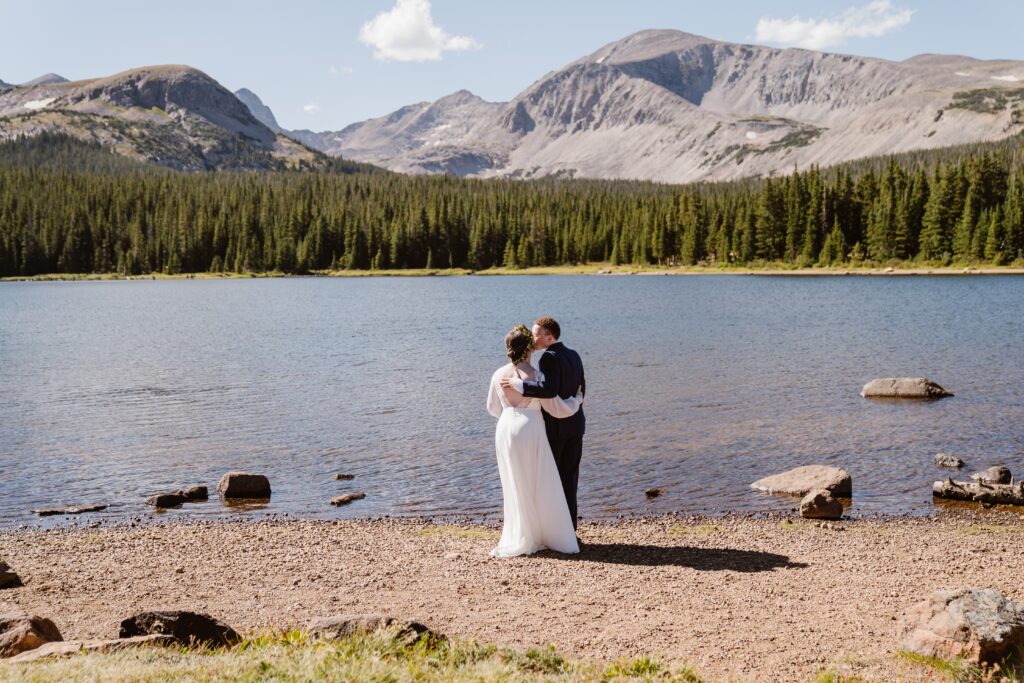 Couple kisses after their completely private weekday elopement ceremony in Boulder, Colorodo