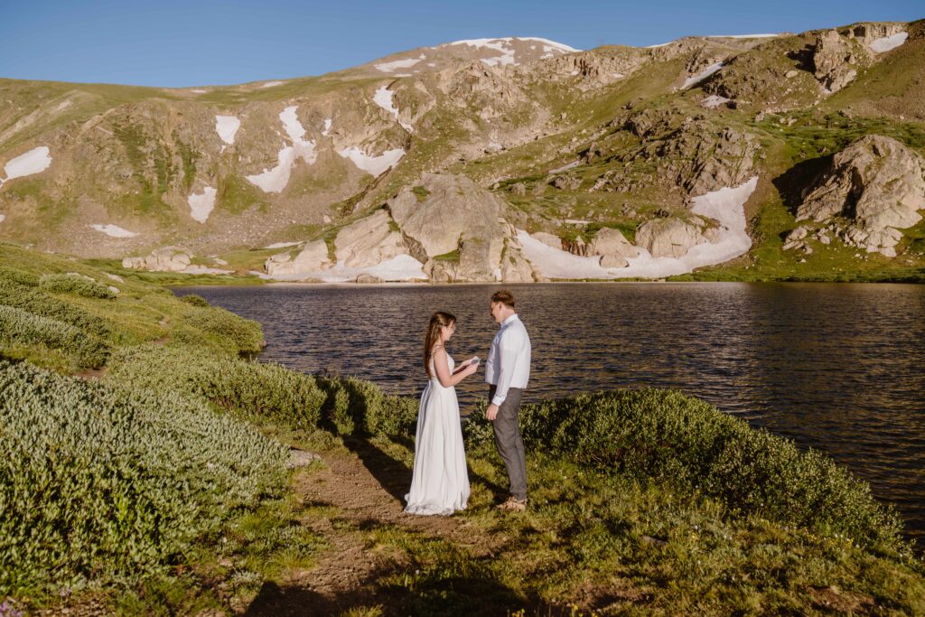 Couple has a completely private elopement at the foot of an alpine lake in Colorado
