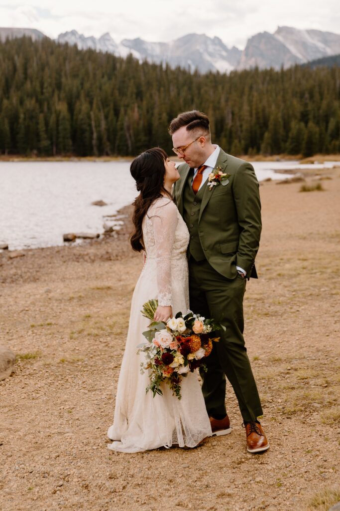 bride and groom look at each other before their Boulder, Colorado elopement