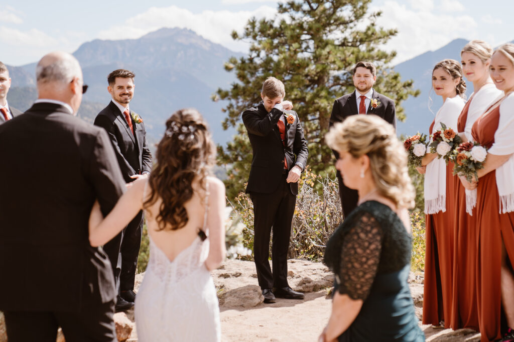 Couple has an emotional first look during their elopement at Rocky Mountain National Park