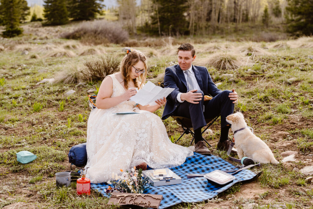 Couple reads letters from their family and friends after their wedding