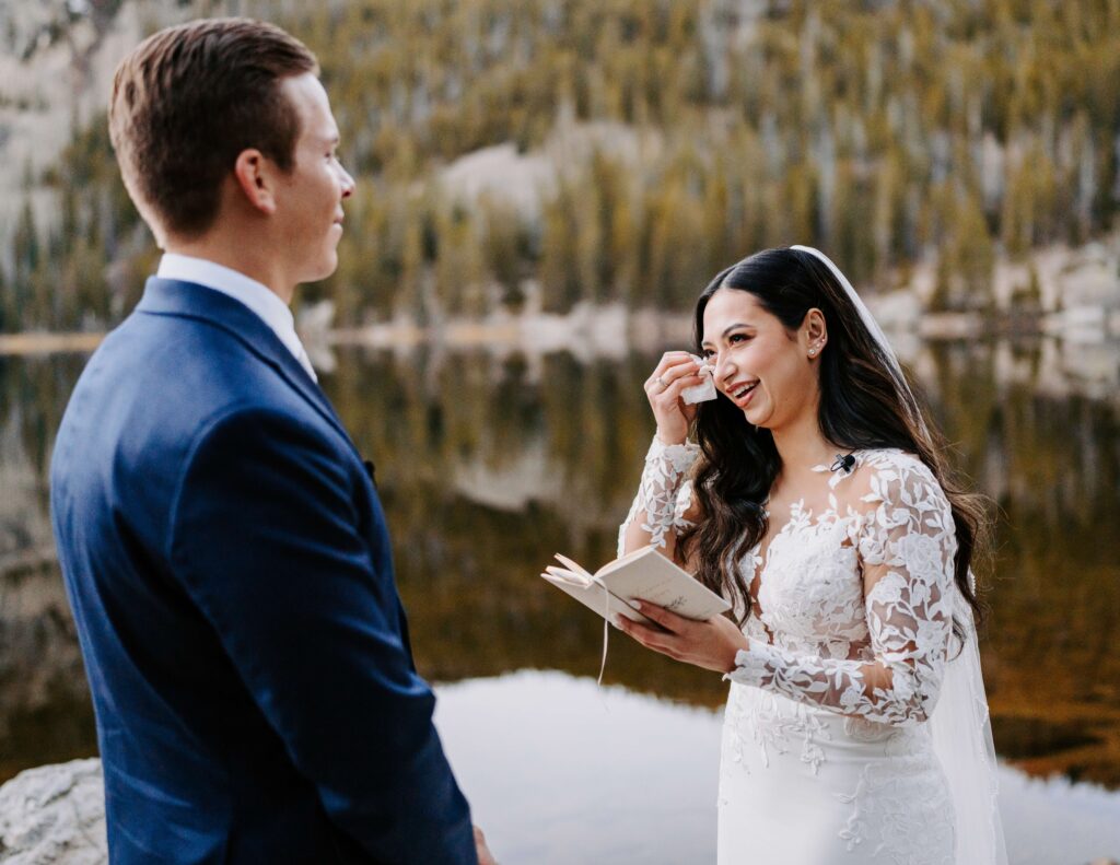 Couple exchanges vow during their elopement in Rocky Mountain National Park