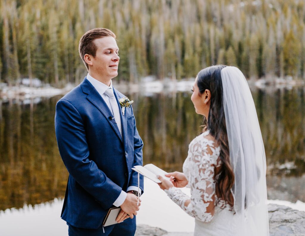 Couple exchanges vow during their elopement in Rocky Mountain National Park