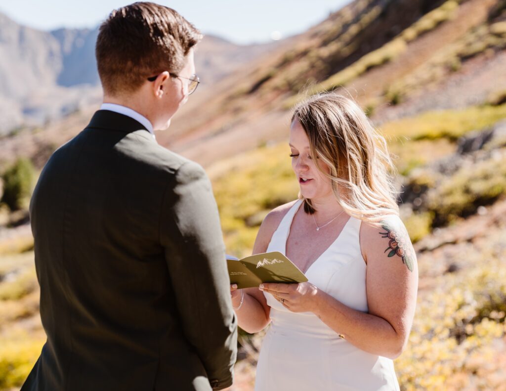 Couple reads their wedding vows to each other during their Colorado elopement