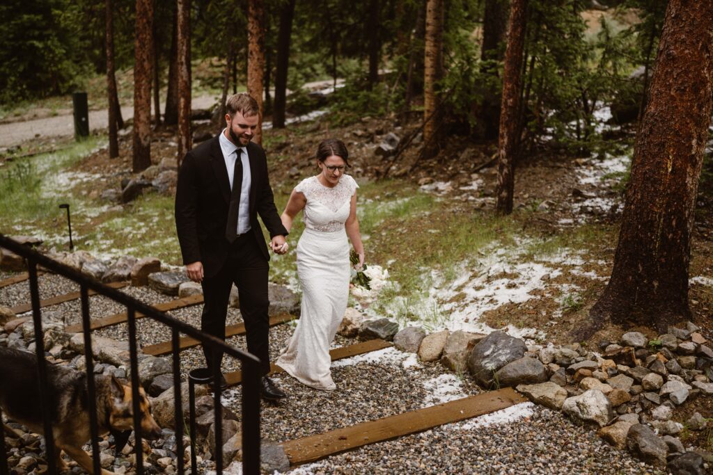 Wedding couple walks to their Airbnb