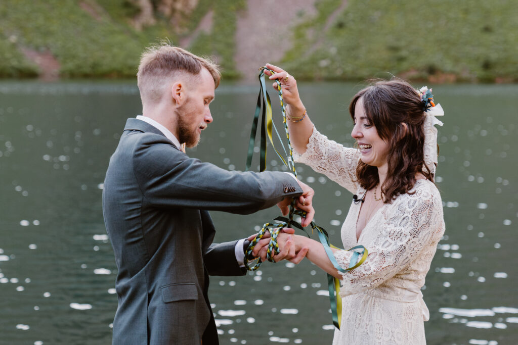couple has a knot tying for their unity ceremony after their elopement