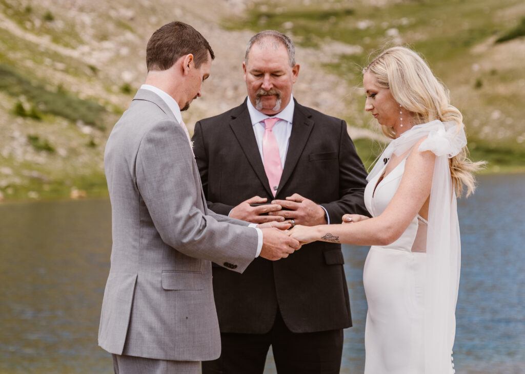 family member marries couple in the colorado mountains