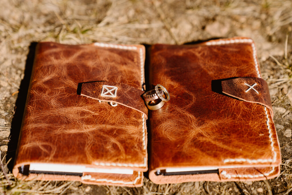20 ways to make your colorado elopement special. Couple makes their own vow books for their elopement