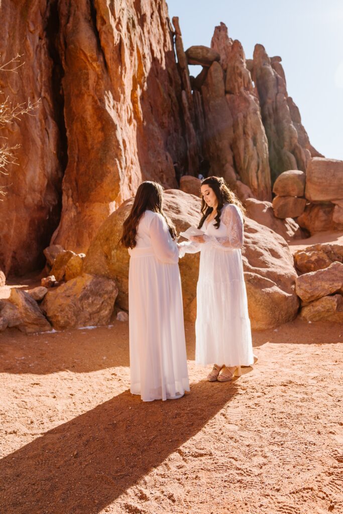 Lesbian couple exchanges vows during their elopement at Garden of the Gods in Colorado Springs, Colorado