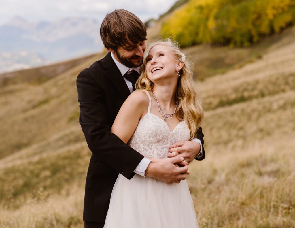 Couple looks into each other's eyes during their colorado elopement