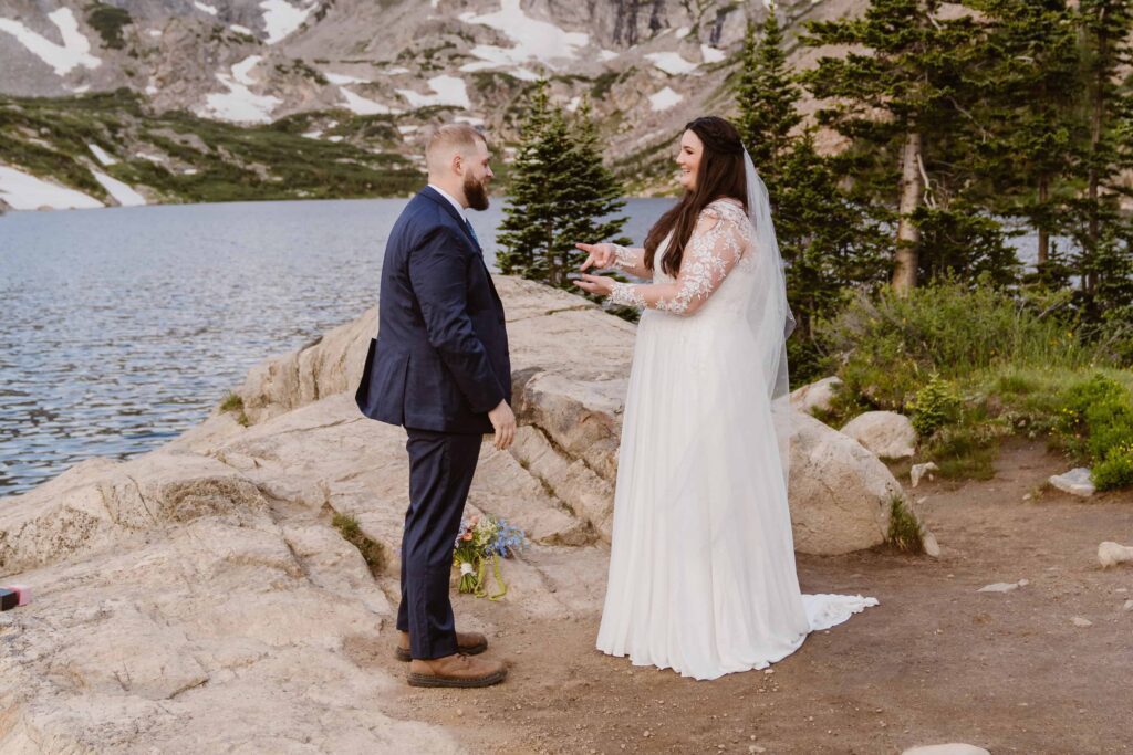 Couple laughing together as they begin their elopement ceremony