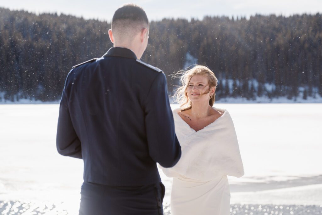 Tender embrace during a snowy Breckenridge elopement