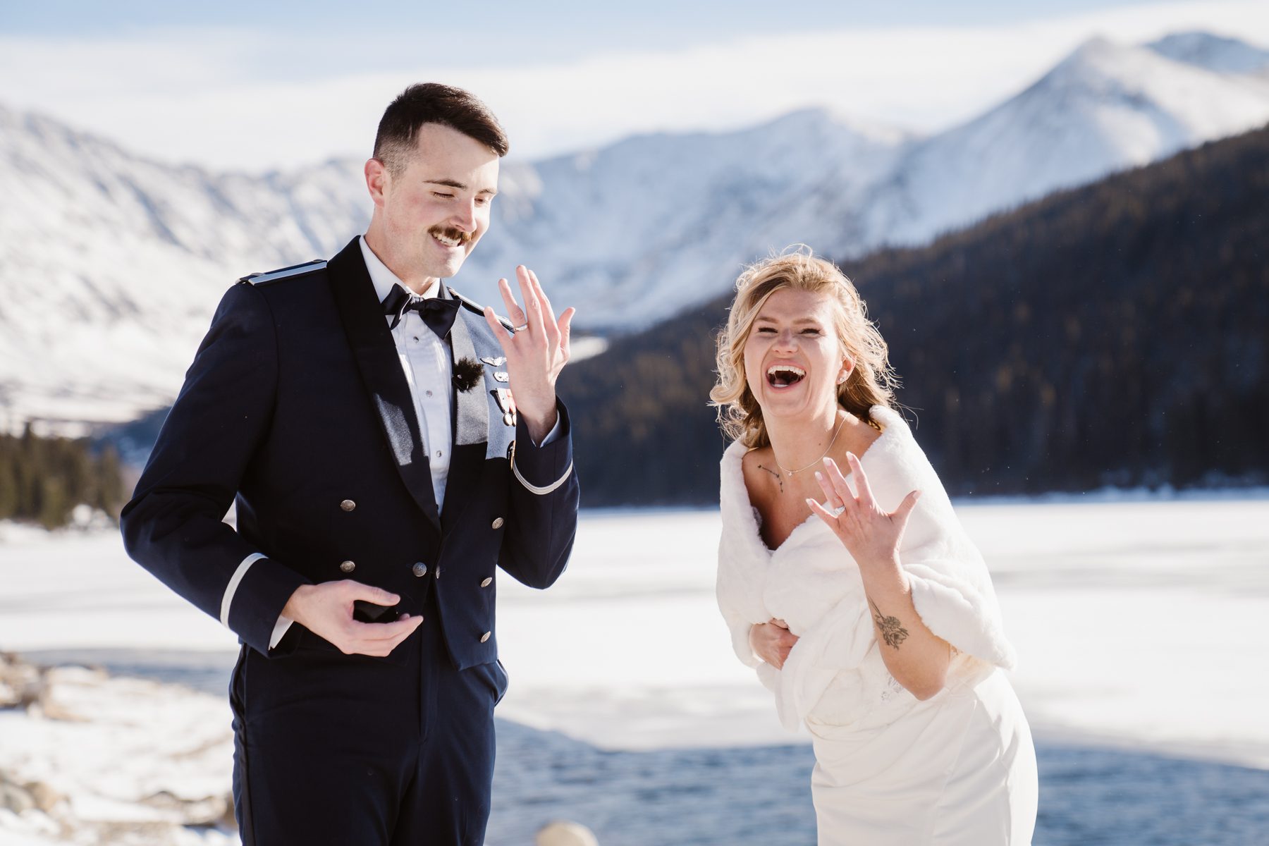 Intimate winter elopement in Breckenridge with mountains covered in fresh snow