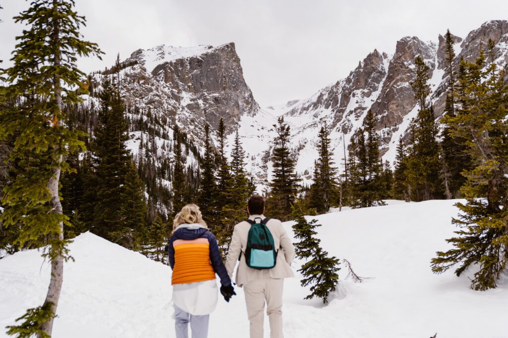 Hiking to Dream Lake after Morgan and Layton's Winter Wedding at Bear Lake Elopement in Rocky Mountain National Park