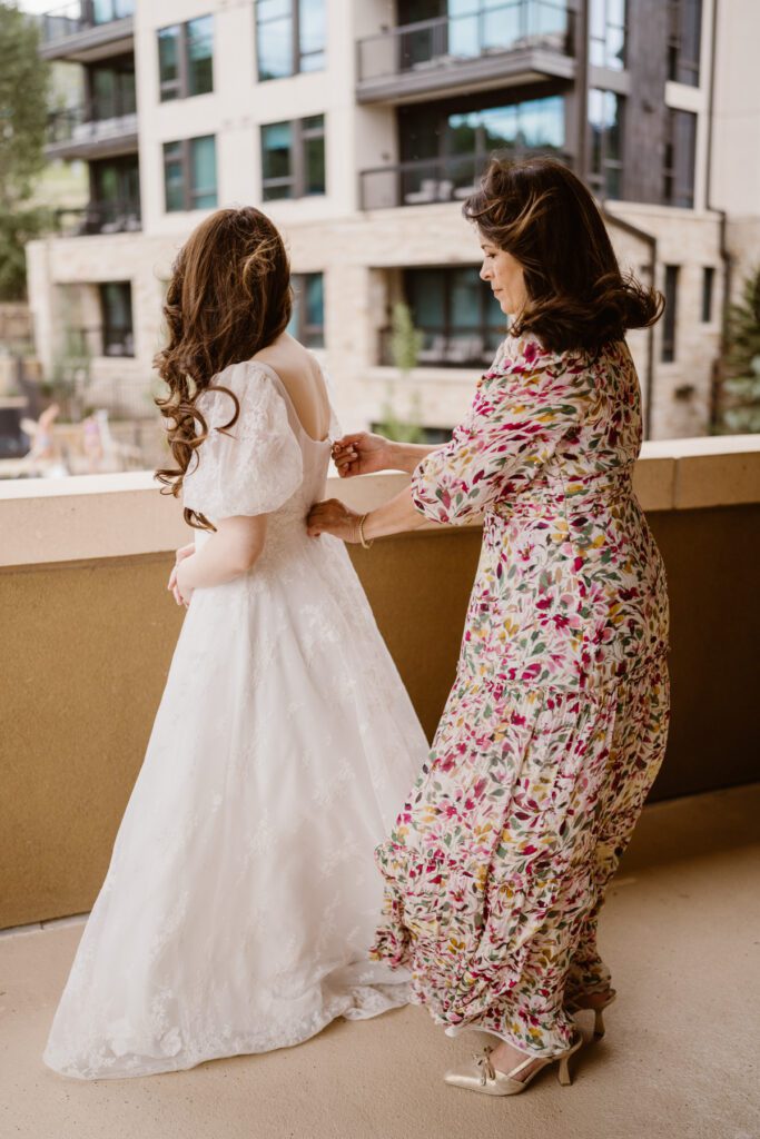Bride getting ready at the Viceroy in Aspen, Colorado for her wedding in Aspen.