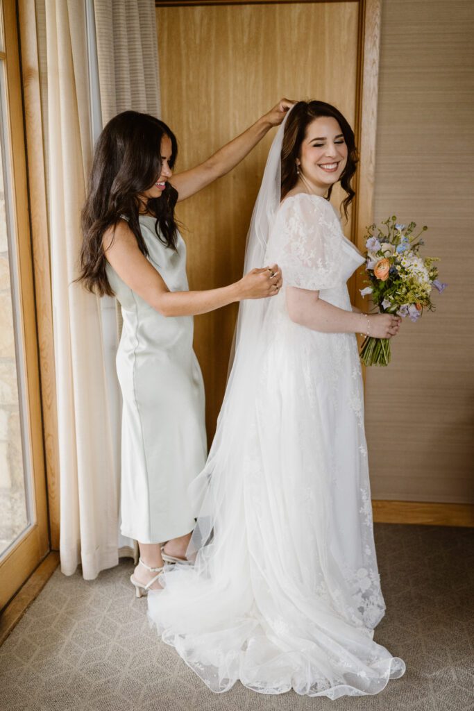 Bride getting ready at the Viceroy in Aspen, Colorado for her wedding in Aspen.